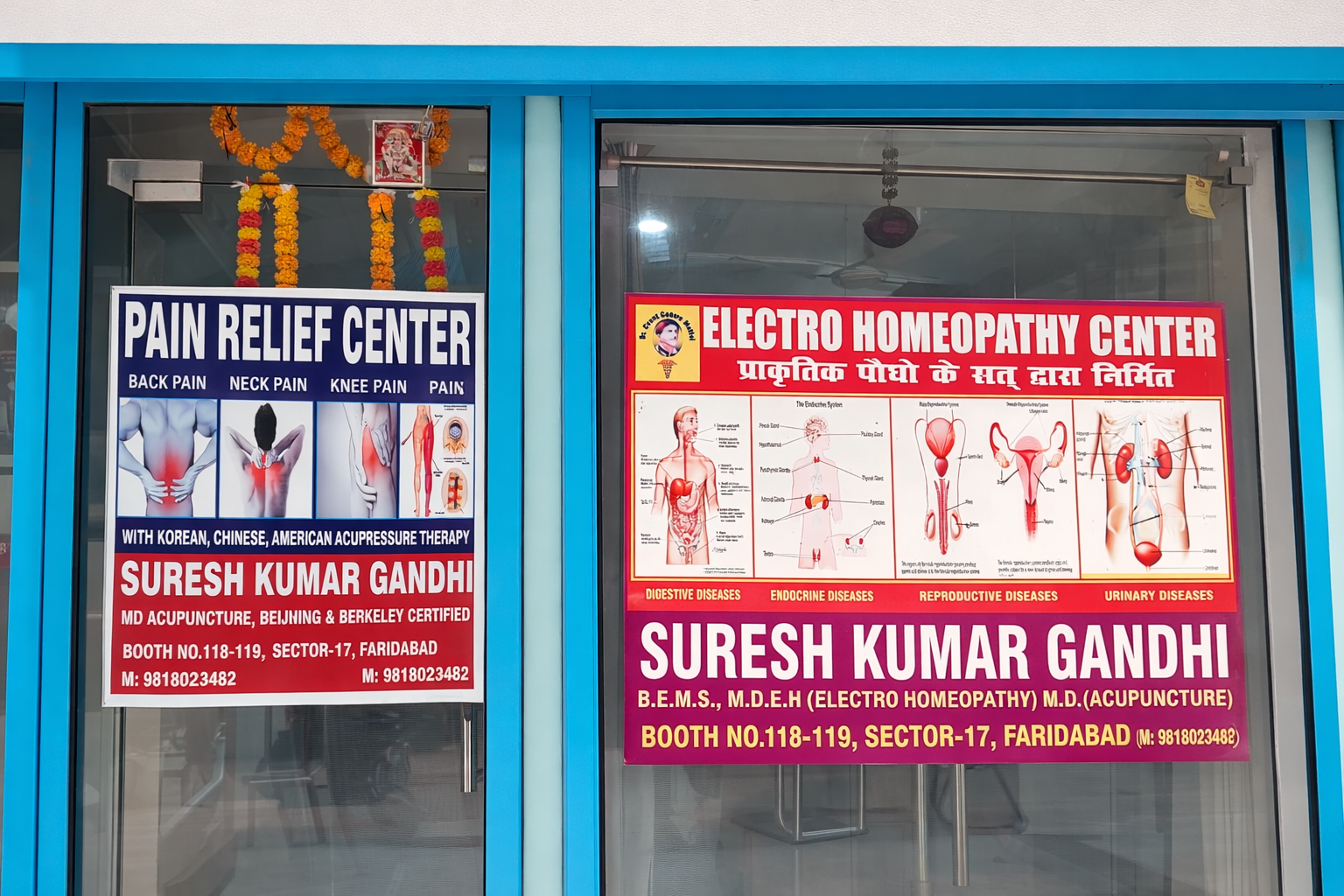 PAIN RELIEF CENTER signboard Booth No.118-119 Sector-17 Faridabad
